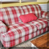 F10. Broyhill plaid sofa. 35”h x 81”wx39”d 